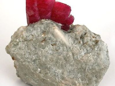 A ruby gemstone in unpolished crystal form